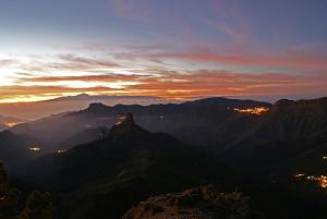 a view of the mountains at sunset at Apartamentos el Motor Tejeda in Tejeda