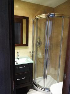 a bathroom with a shower and a sink at Vista Bella Apartment in Calpe