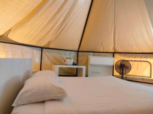 a bedroom with a bed in a tent at khaolakcamping in Ban Lam Ru (1) +33 photos