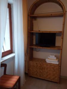 A television and/or entertainment centre at B&B Celestina Peschici