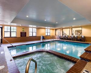 a large swimming pool in a hotel room at Comfort Suites near NASA - Clear Lake in Webster