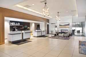 a lobby of a hotel with a help desk at Radisson Hotel Salt Lake City Downtown in Salt Lake City