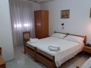 Postel nebo postele na pokoji v ubytování Hotel Europa