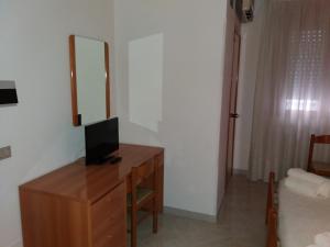 TV a/nebo společenská místnost v ubytování Hotel Europa