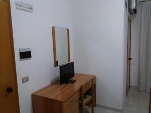 TV a/nebo společenská místnost v ubytování Hotel Europa