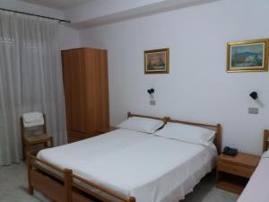Postel nebo postele na pokoji v ubytování Hotel Europa