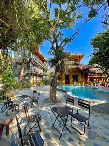 a resort with chairs and a swimming pool at Mai Chau Village View in Mai Châu
