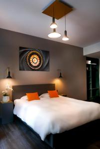 Postel nebo postele na pokoji v ubytování Atlas Hotel Brussels