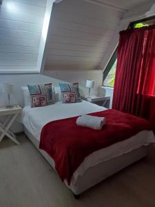 En eller flere senge i et værelse på Breamhill Accommodation + 15 billeder