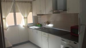 Kuchyňa alebo kuchynka v ubytovaní Tres Cruces Apartment