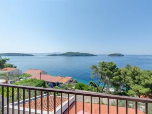 a view of a large body of water from a balcony at Apartments Lea in Prizba