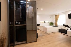 a living room with a sliding glass door leading into a living room at Flá Suite Castello in Cagliari