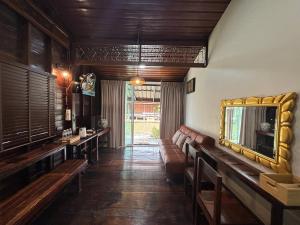 a room with benches and a mirror on the wall at Reuan Vilawan Waterfront in Ban Nong Chaeng +5 photos