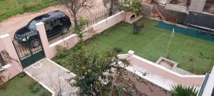 an aerial view of a car parked on top of a house at Harmony 3 in Artemida