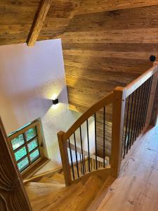 an overhead view of a staircase with wooden floors at Dazumahl schafft besondere Augenblicke für Genießer im naturnahen Private Hideaway in der Oststeiermark in Puch bei Weiz +125 photos