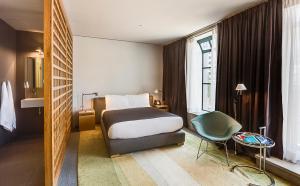 Letto o letti in una camera di Hotel Gault
