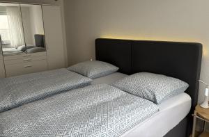 Tempat tidur dalam kamar di WohlfühlQuartier Hückeswagen
