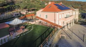 an aerial view of a house with a roof at Locanda Mirei in Finale Ligure
