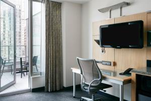 TV a/nebo společenská místnost v ubytování World Center Hotel