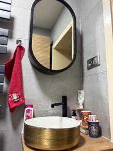a bathroom with a round sink and a mirror at Nest Salzkammergut- Cozy Stay in Bad Aussee, Near Hallstatt - Garden & BBQ in Bad Aussee +85 photos