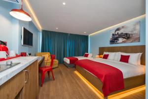 a hotel room with a bed and a sink at Taksim Istanbul Nis Hotel - Istiklal Street in Istanbul