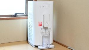 a blender sitting on the floor next to a window at Yamadaya in Tottori
