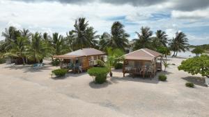 an aerial view of a resort on the beach at Hakamanu Lodge in Tikehau