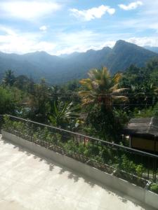 a view of the mountains from the balcony of a house at Arhh castle in Ginigathena +10 photos