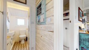 a bathroom with a toilet and a sink at E41 Silver Mist, Riviere Towans in Hayle +10 photos