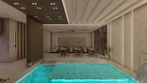 a pool in a room with a table and chairs at Miti Apartment with Marina View & Spa Access in Veliko Gradište