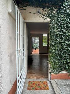 an entrance to a building with an open door at The Cats Nail house in Cali