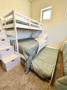 a bunk bed in a room with a bunk bedouble at Spacious Home in Page +24 photos