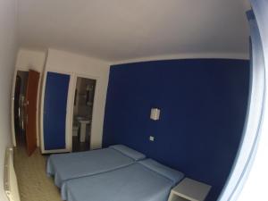 Postel nebo postele na pokoji v ubytování Hostal German + 8 fotografií