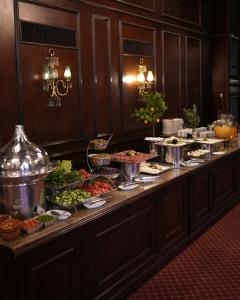 a buffet line with many different dishes of food at Chtaura Park Hotel in Chtaura