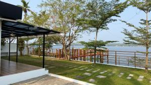 a view of the water from a house at Mayooram Back water Pool Villa in Kollam