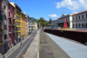 a city street filled with lots of tall buildings at Hotel Mary in La Spezia