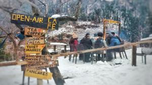 a group of people standing in the snow at YAARI Shangarh in Shangarh