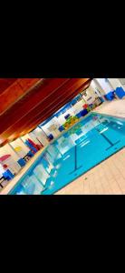 an overhead view of a swimming pool in a room at Sea view 1 in Heysham