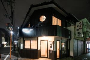 a small building with a small window on top of it at Kyooyado Muromachi in Kyoto