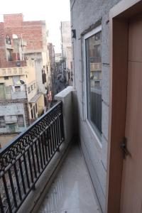 a balcony with a view of a city at Hotel Dreamland in Malsiān Shāhkot