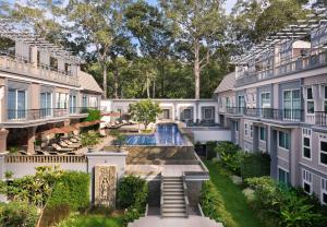 an aerial view of a mansion with a swimming pool at J7 Angkor Hotel in Siem Reap