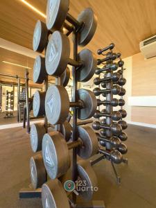 a rack of wine barrels in a gym at Get Sense By 123Quarto Hospedagem in João Pessoa