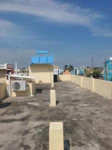 a rooftop of a building with a microwave on it at Unique Stays in Pondicherry