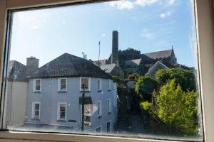 a view from a window of a group of houses at Hacketts Bar And Accommodation in Kilkenny