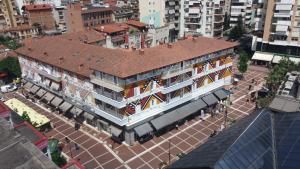 an overhead view of a building with a tile roof at BAZAAR HOTEL Center in Tirana