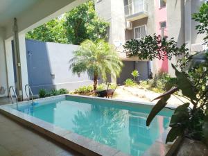 a swimming pool in the middle of a building at Mendoza in Posadas