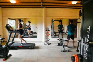 a group of people exercising in a gym at Porto Preguiças Resort in Barreirinhas