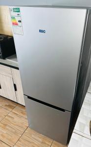 a refrigerator in a kitchen with its door open at Kasi Retreat in Northam