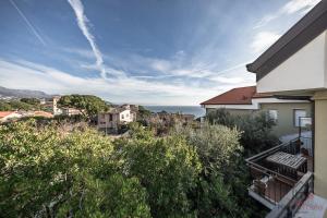 a view of the ocean from a house at Panorama Blu - Spiaggia 7min - Terrazza - WiFi in Celle Ligure