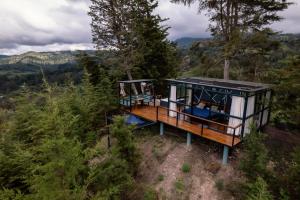 an overhead view of a tiny house in the woods at Kamarí Glamping in San Francisco